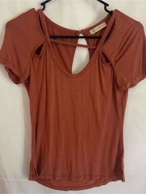 Hologram cut out top in rust color, size XS